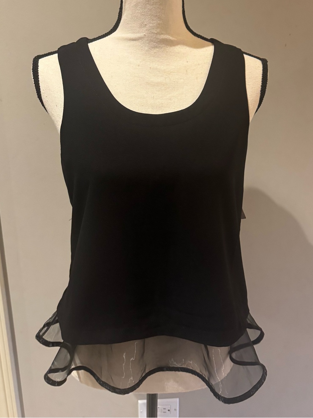 AKIRA Black Sleeveless Tank with Sheer Ruffle Hem
